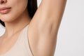 UNDER ARMS